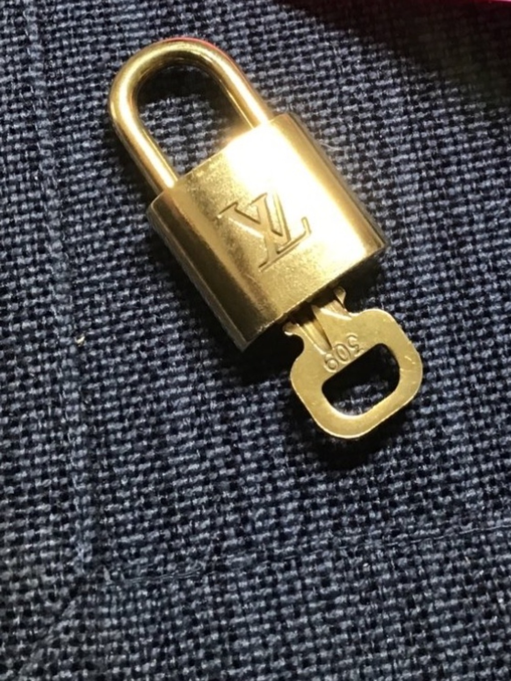 Authentic Louis Vuitton lock and key